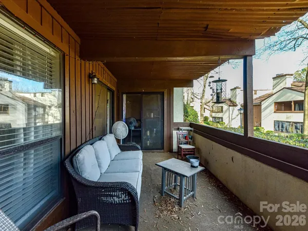 a building outdoor space with patio furniture