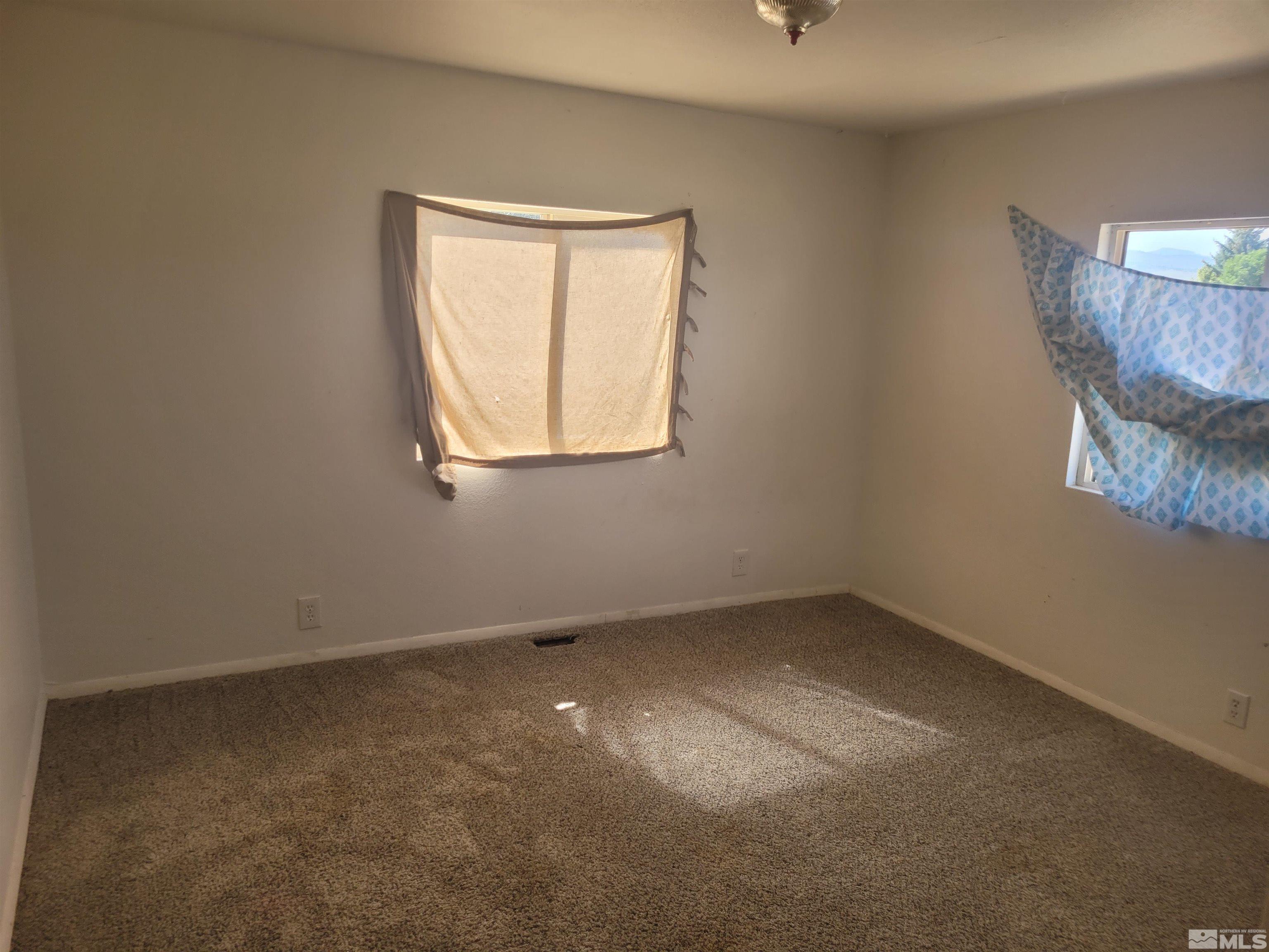 17820 Mockingbird Drive Reno, NV 89508 - Photo 11 of 14 an empty room with a window