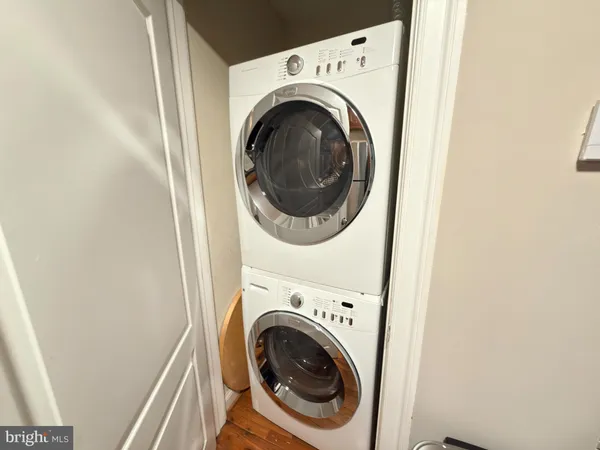 a utility room with dryer and washer