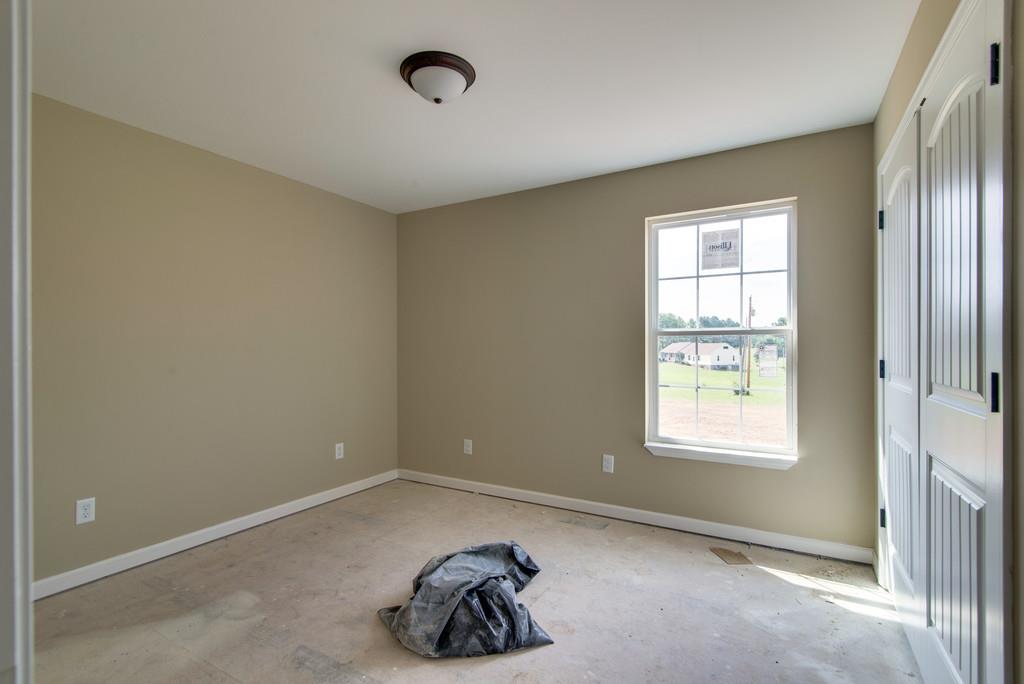 590 Murrell Road Dickson, TN 37055 - Photo 17 of 25 an empty room with windows