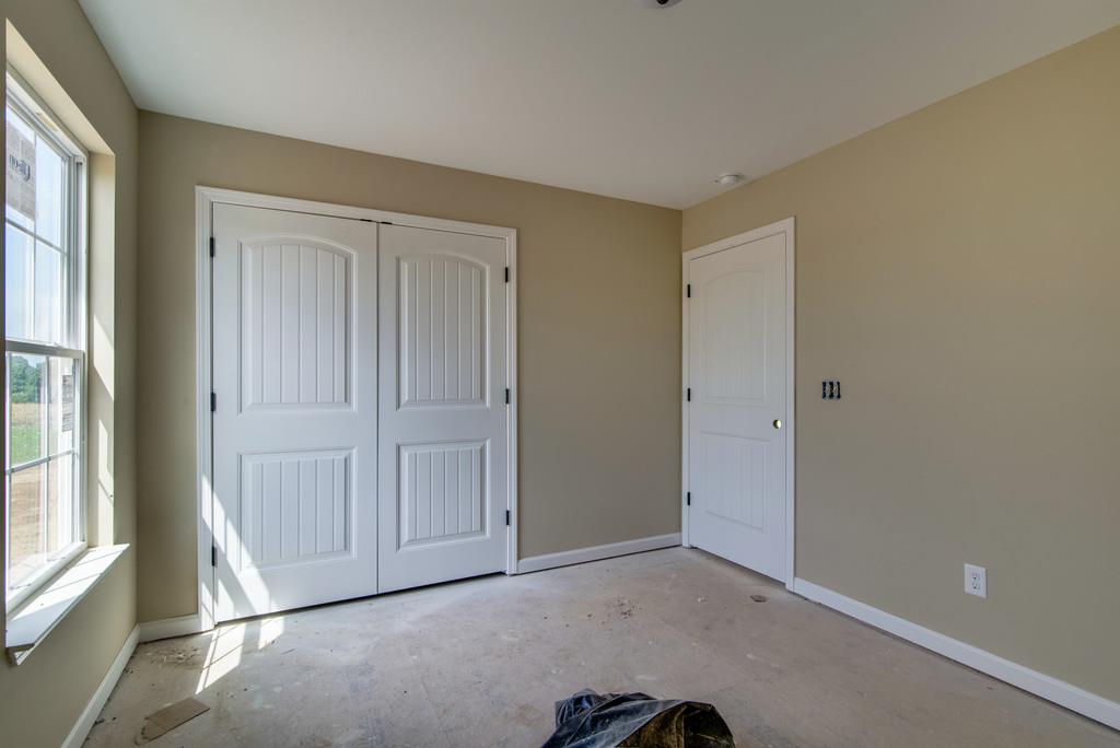 590 Murrell Road Dickson, TN 37055 - Photo 18 of 25 a view of an empty room with a window