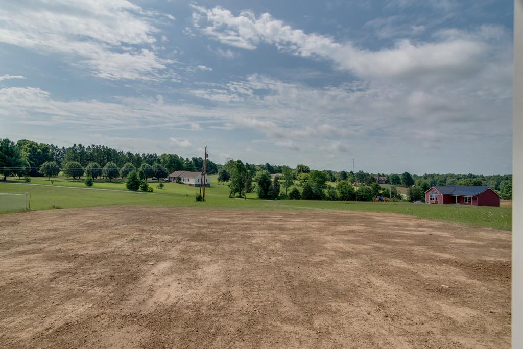 590 Murrell Road Dickson, TN 37055 - Photo 22 of 25 a view of a field and trees