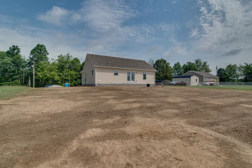 590 Murrell Road Dickson, TN 37055 - Photo 25 of 25 a view of a house with a yard