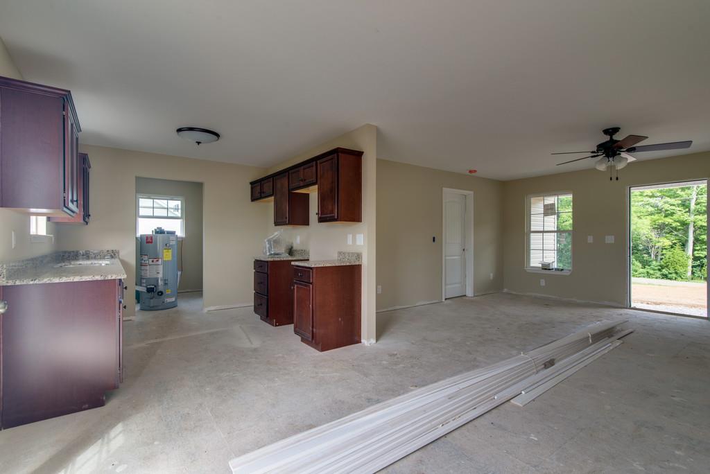 590 Murrell Road Dickson, TN 37055 - Photo 8 of 25 a living room with furniture and a flat screen tv