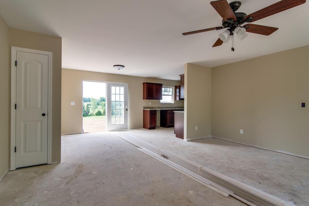590 Murrell Road Dickson, TN 37055 - Photo 9 of 25 a view of a livingroom with a ceiling fan and window