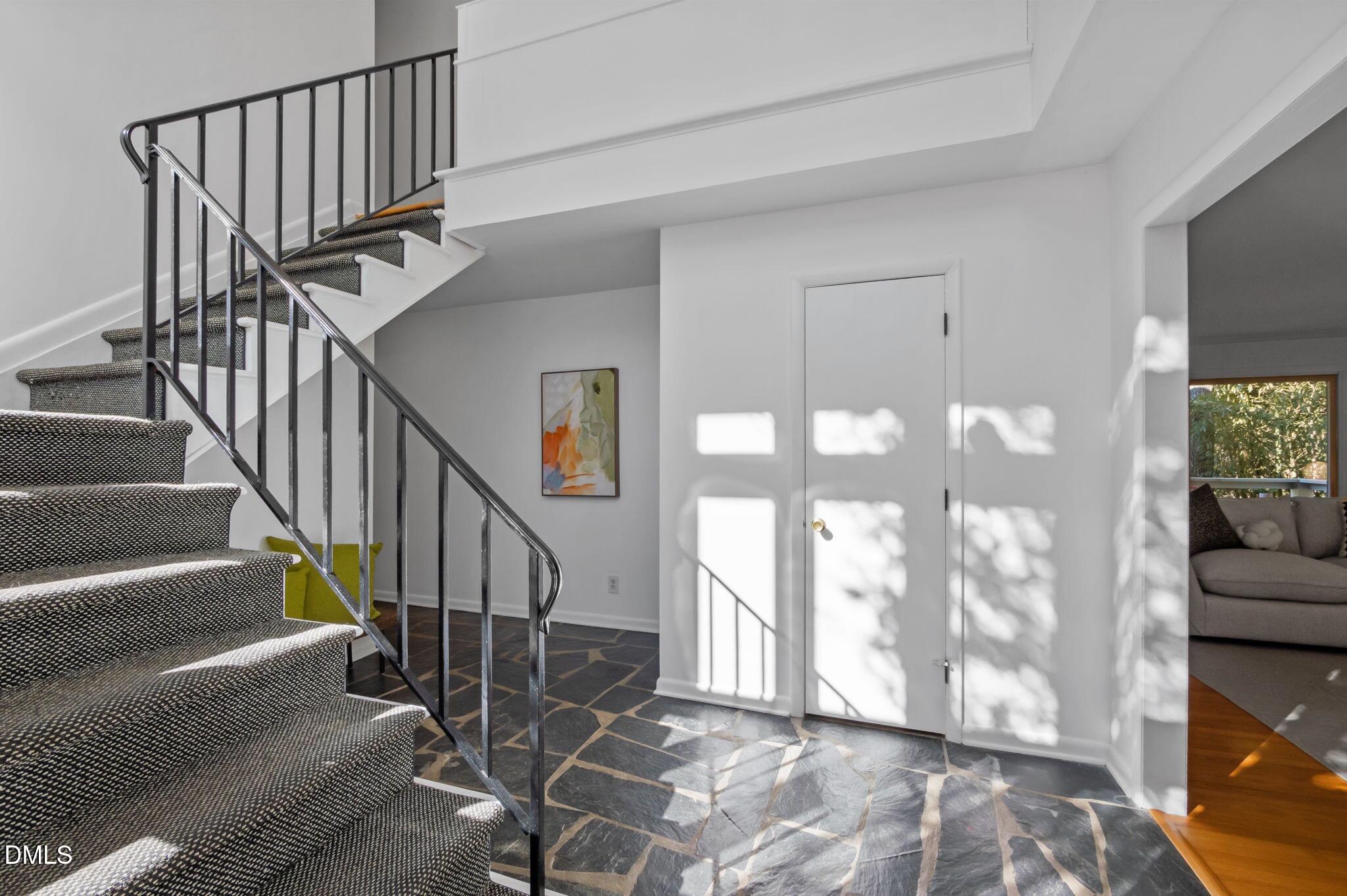 1709 Curtis Road Chapel Hill, NC 27514 - Photo 28 of 62 a view of entryway and hall with wooden floor