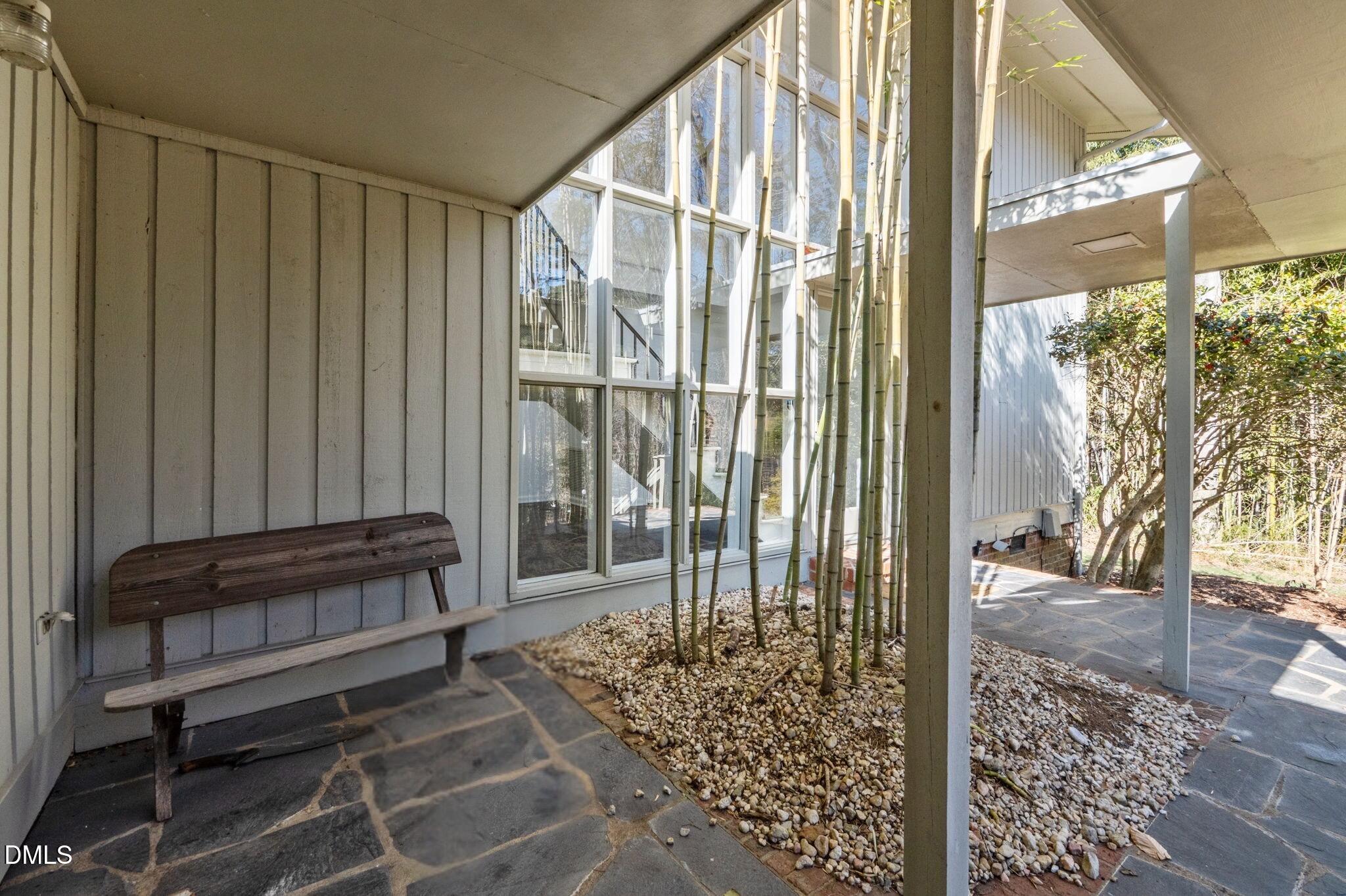 1709 Curtis Road Chapel Hill, NC 27514 - Photo 58 of 62 a view of a porch with a bench