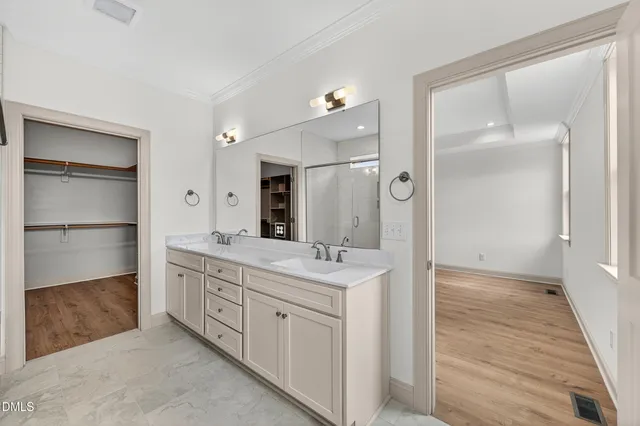 a picture of a bathroom with a shower