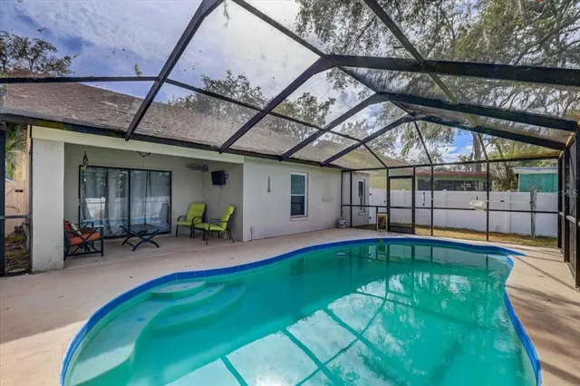 a view of a chairs and table on the wooden floor