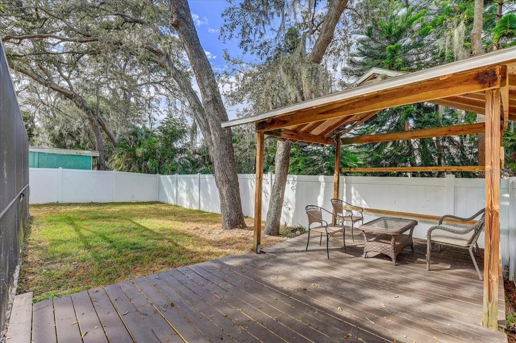 2524 Wrencrest Circle Valrico, FL 33596 - Photo 26 of 36 a view of a chairs and table on the wooden floor