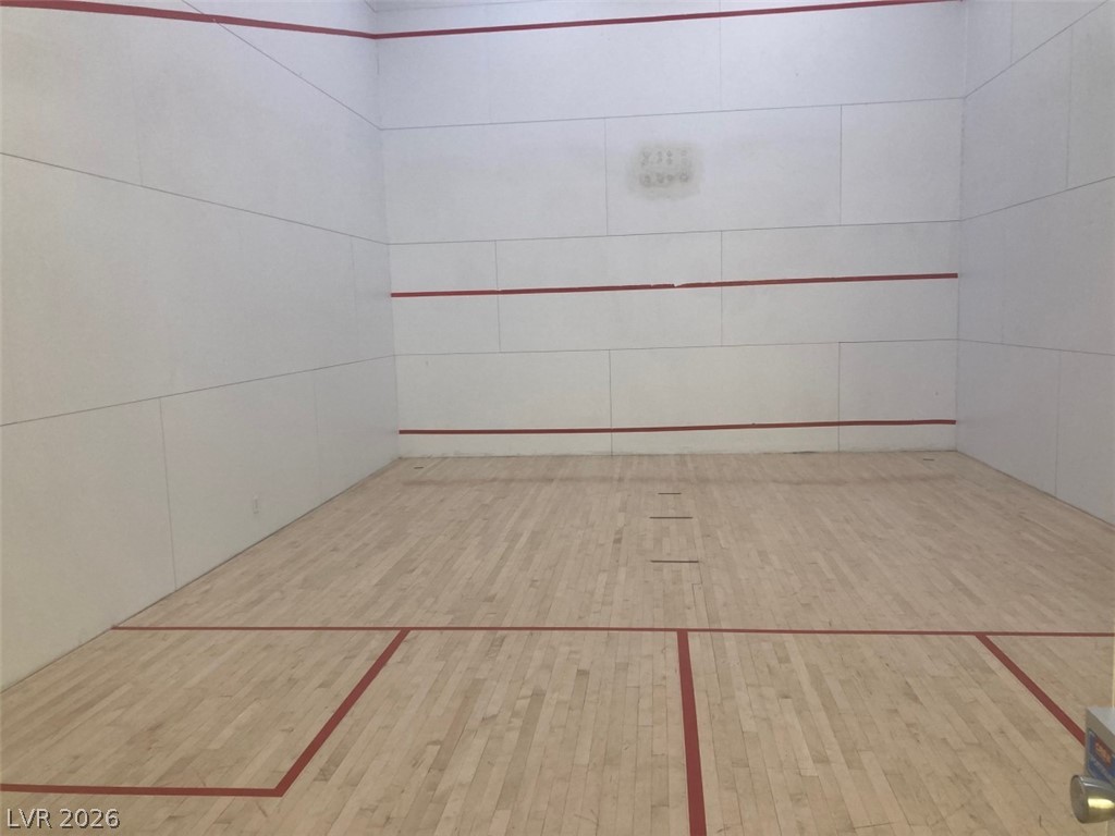 210 East Flamingo Road, Unit 137 Las Vegas, NV 89169 - Photo 28 of 32 Engage in active living with this dedicated, well-maintained squash court featuring hardwood flooring.