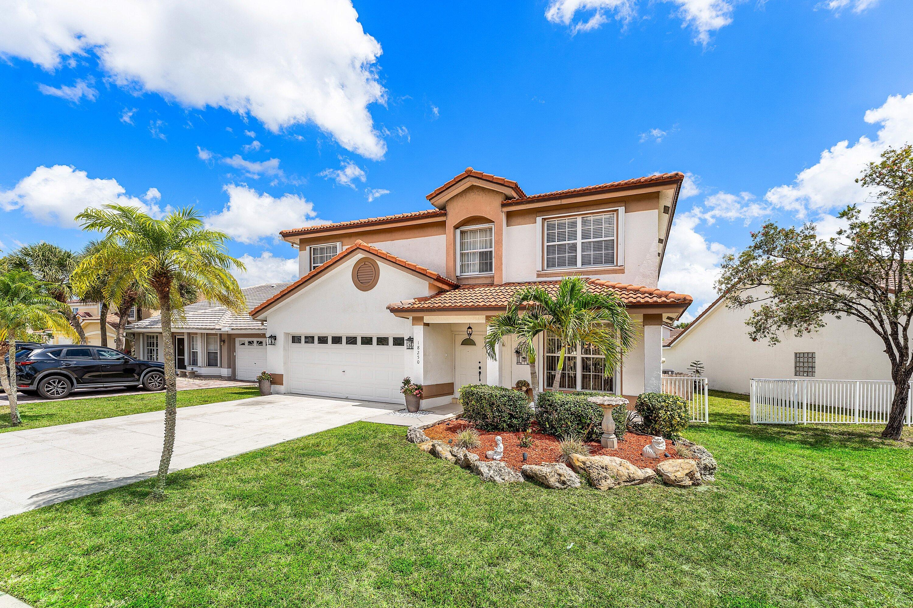 18250 Blue Lake Way Boca Raton, FL 33498 - Photo 2 of 50 Exterior front
