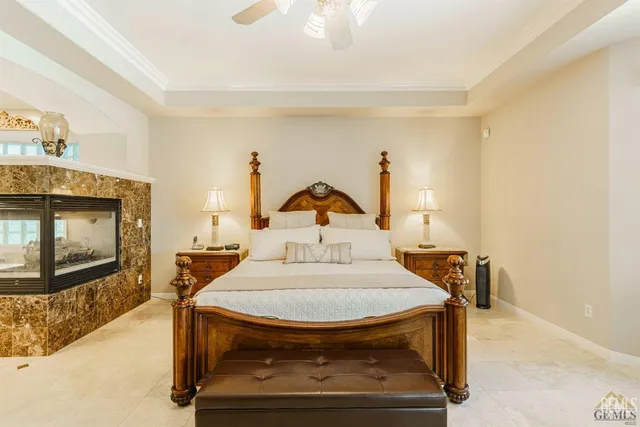 a bathroom with a tub shower and mirror