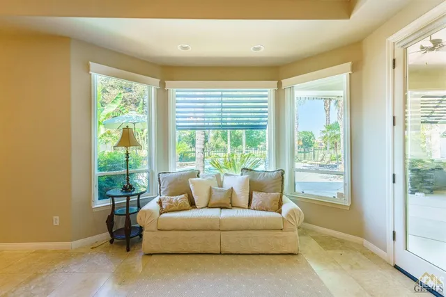 a spacious bathroom with a bathtub shower sink double and mirror