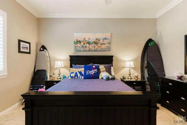 a living room with furniture windows and a chandelier