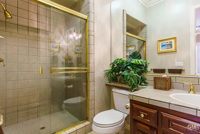 a view of a porch with chairs and a yard