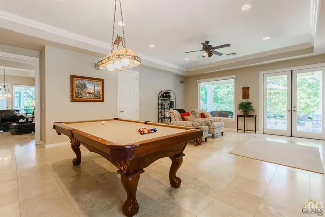a bathroom with a sink a mirror and a shower