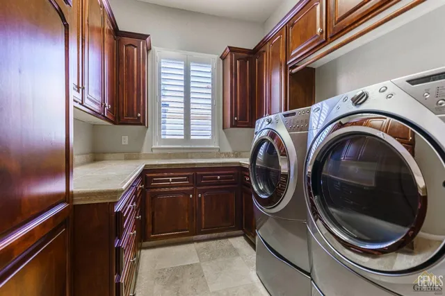 a bathroom with a sink mirror and toilet