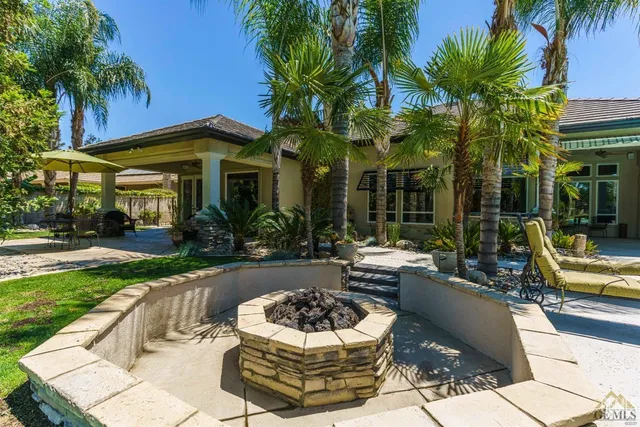 a view of a building with a yard