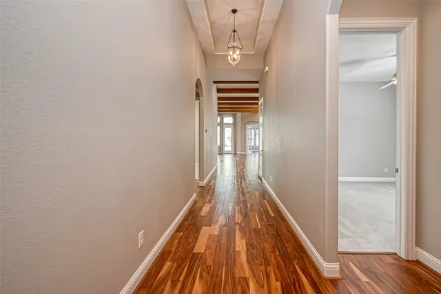 a view of balcony with wooden floor