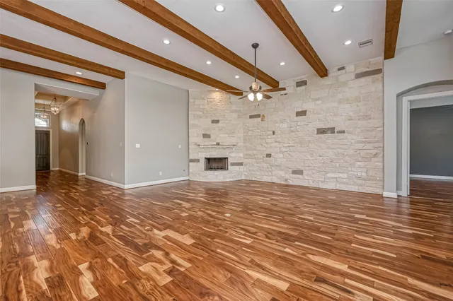 a view of a hallway with a wooden cabinets