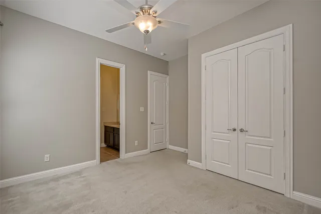 an empty room with a bathroom