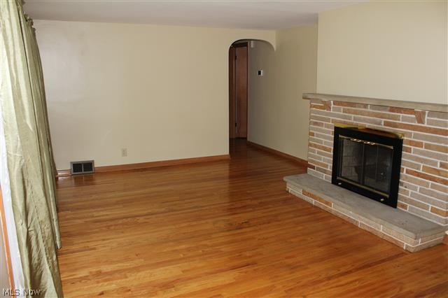 1438 Isler Circle Northwest Canton, OH 44708 - Photo 4 of 11 There is also a wood burning fireplace with a stone hearth.
