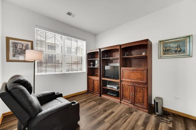a view of workspace with furniture and windows