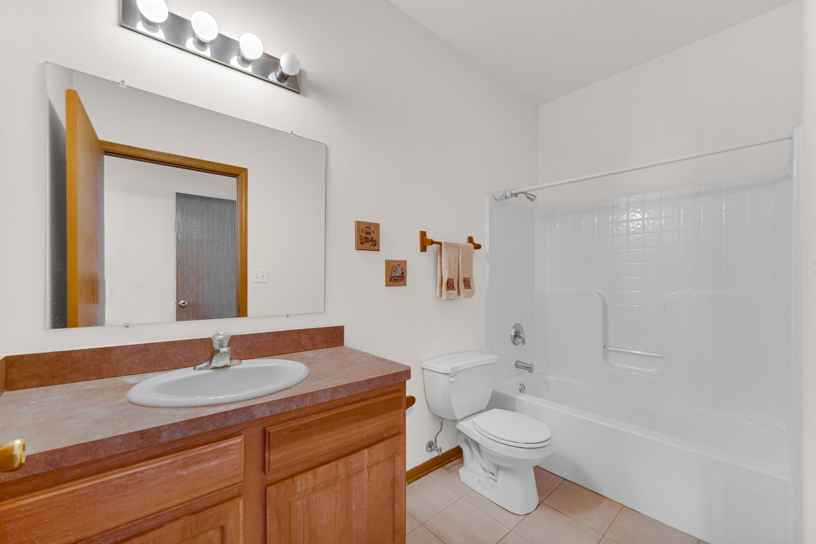 1397 Fox Hound Trail Beecher, IL 60401 - Photo 20 of 23 a bathroom with a granite countertop sink a toilet and a mirror