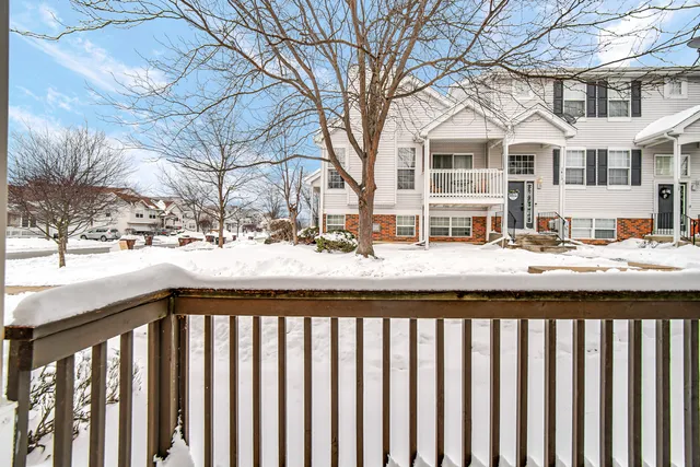 a street view with wooden fence