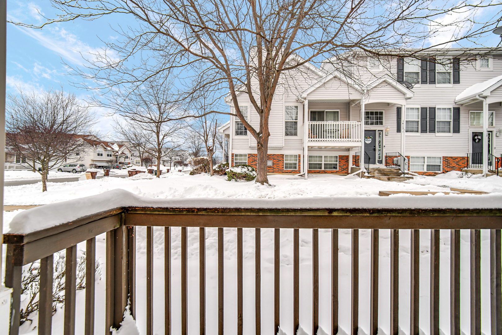 1397 Fox Hound Trail Beecher, IL 60401 - Photo 23 of 23 a street view with wooden fence