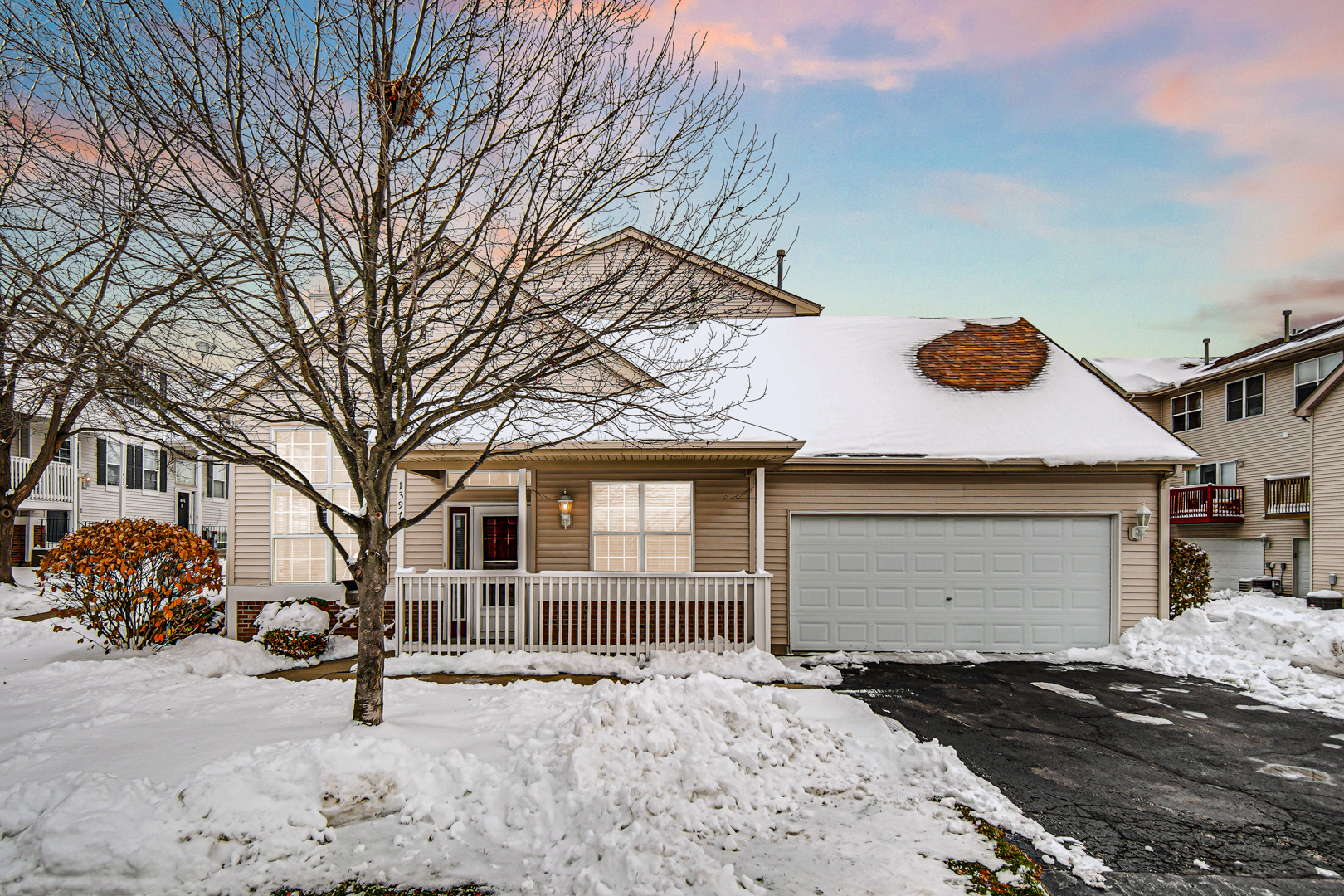 1397 Fox Hound Trail Beecher, IL 60401 - Photo 3 of 23 a front view of a house with a yard and garage