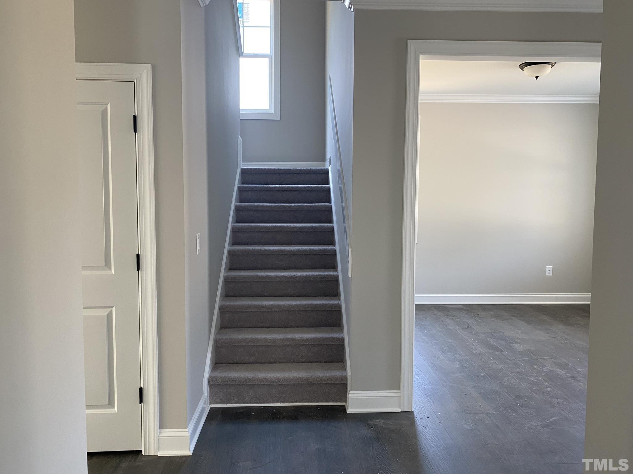 102 Buckstone Place Willow Spring, NC 27592 - Photo 11 of 25 a view of an entryway with wooden floor