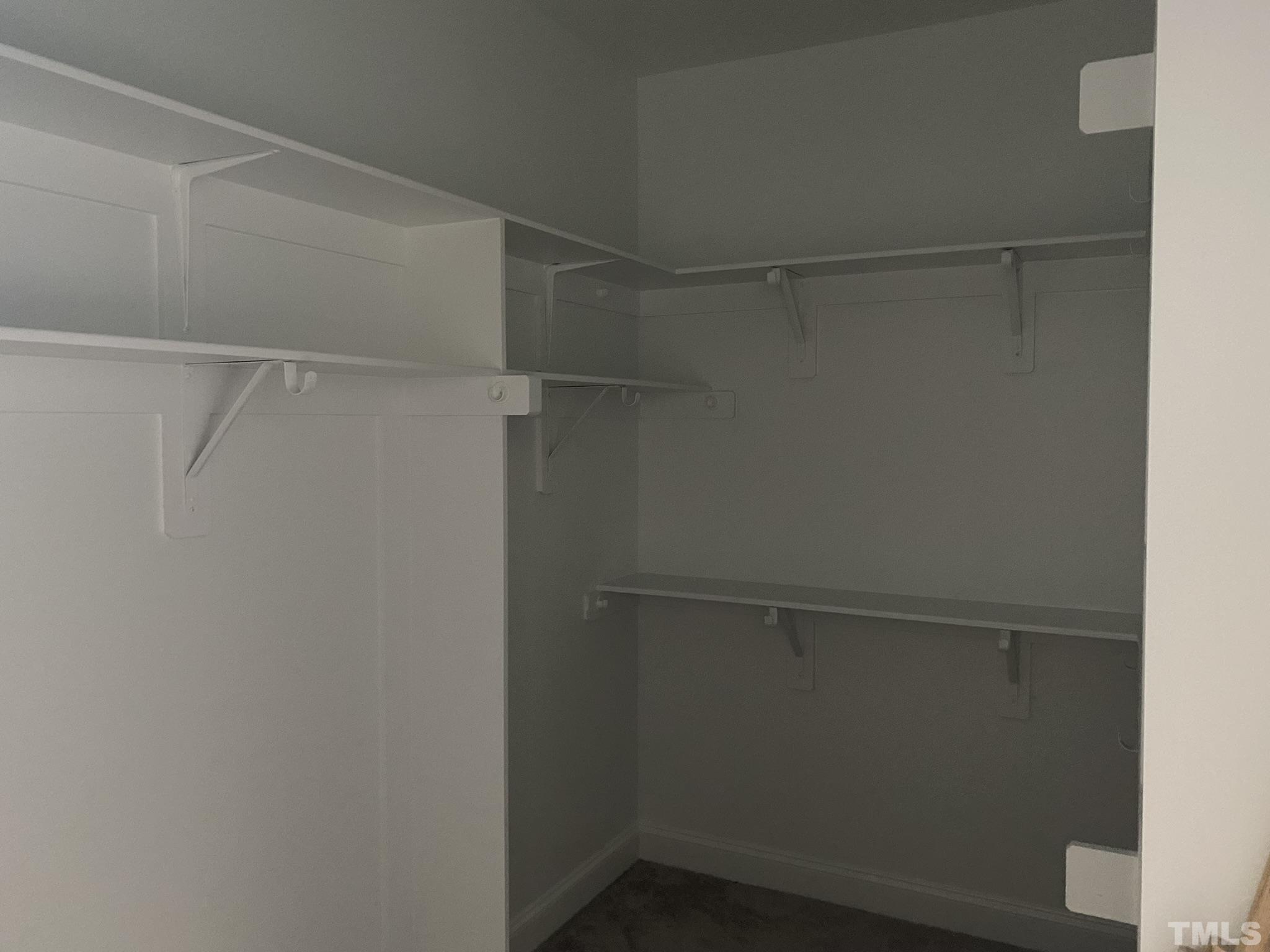 102 Buckstone Place Willow Spring, NC 27592 - Photo 16 of 25 a empty walk in closet
