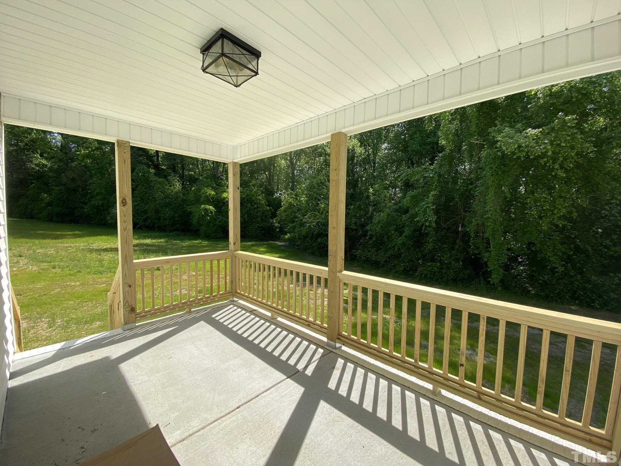 102 Buckstone Place Willow Spring, NC 27592 - Photo 22 of 25 a view of a balcony