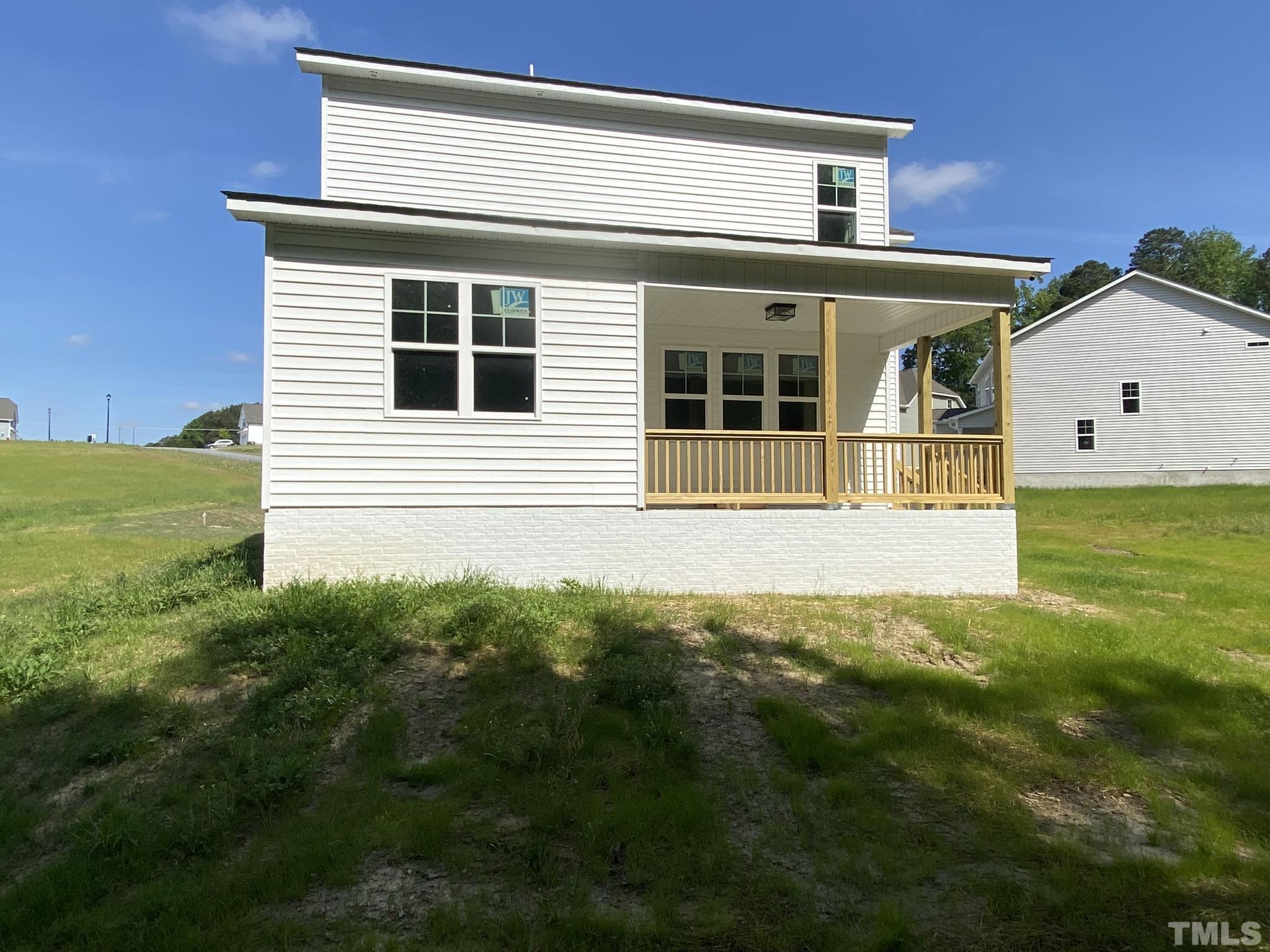 102 Buckstone Place Willow Spring, NC 27592 - Photo 24 of 25 a house view with a garden space