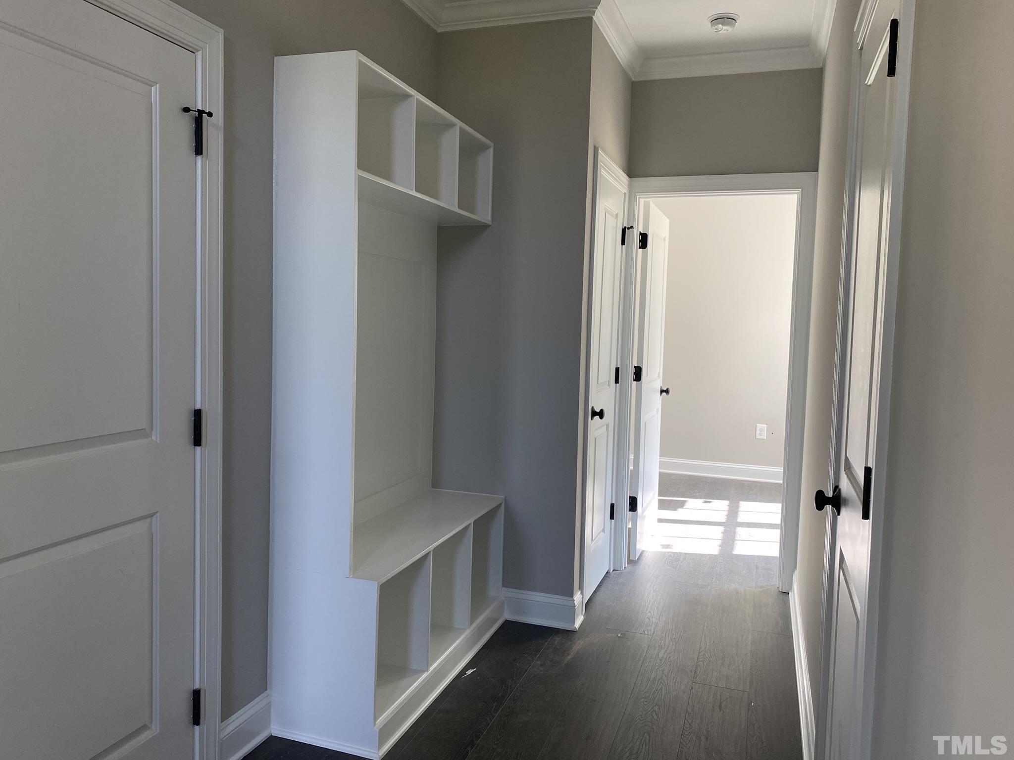 102 Buckstone Place Willow Spring, NC 27592 - Photo 10 of 25 a view of a hallway with wooden floor