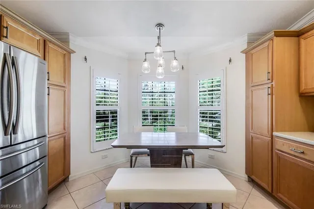 a bathroom with a bathtub and a window