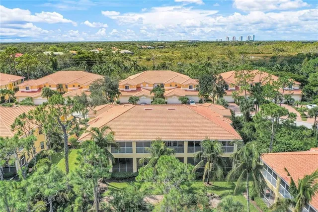 a view of a lake with a building in the background