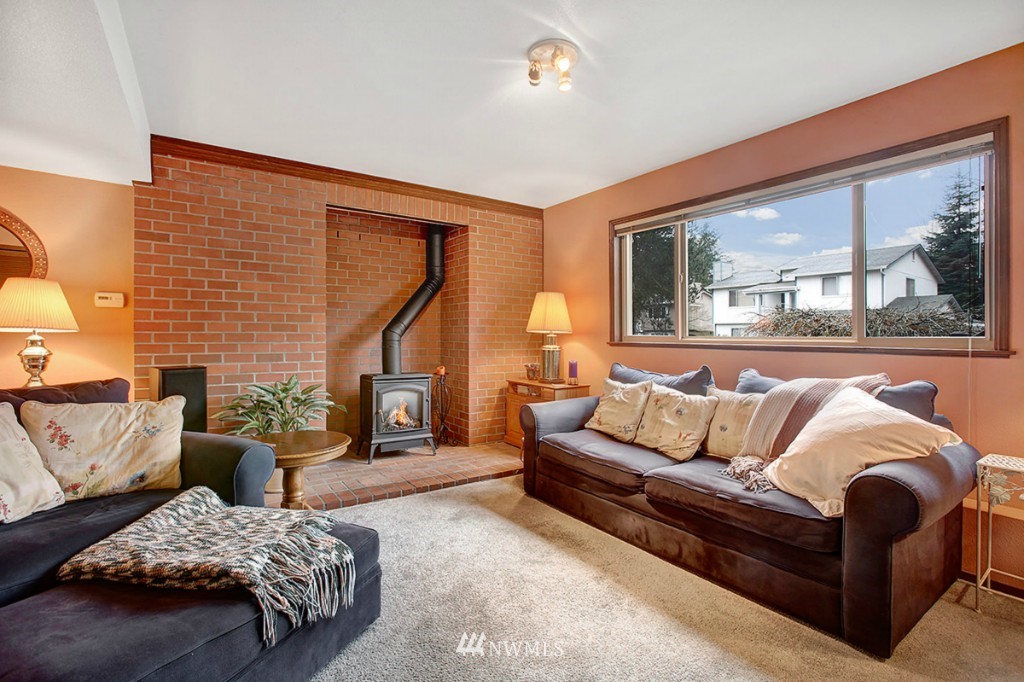 611 204th Street Southeast Bothell, WA 98012 - Photo 15 of 24 a living room with furniture and a large window