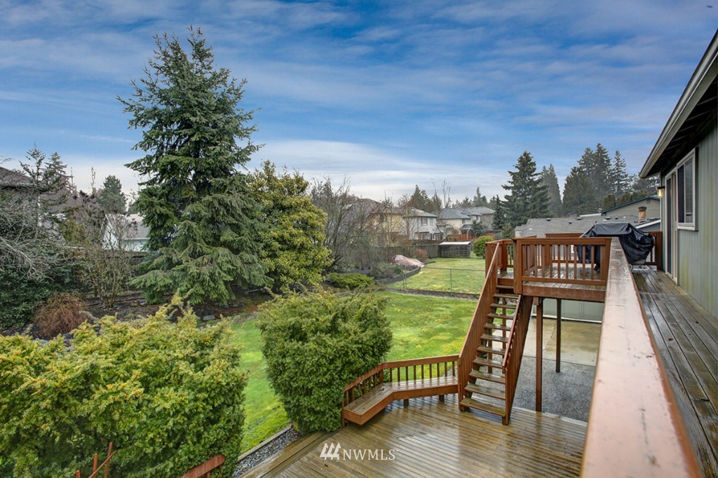 611 204th Street Southeast Bothell, WA 98012 - Photo 18 of 24 a view of balcony with furniture and wooden floor