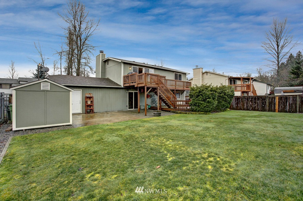 611 204th Street Southeast Bothell, WA 98012 - Photo 22 of 24 a view of a house with backyard and garden