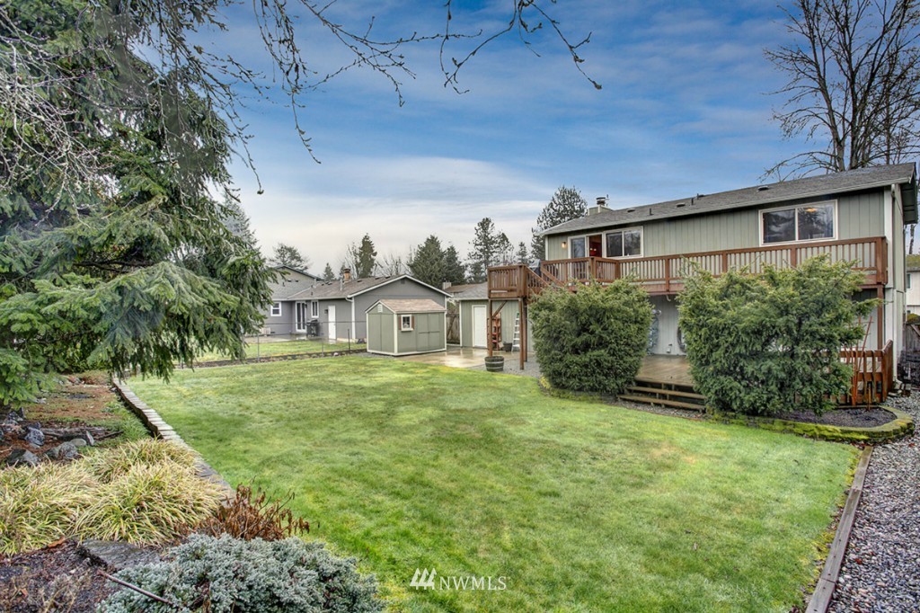 611 204th Street Southeast Bothell, WA 98012 - Photo 23 of 24 a front view of a house with a yard