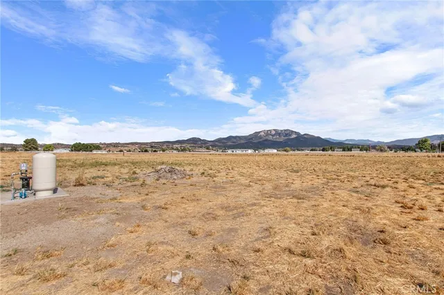 a view of an ocean and a mountain