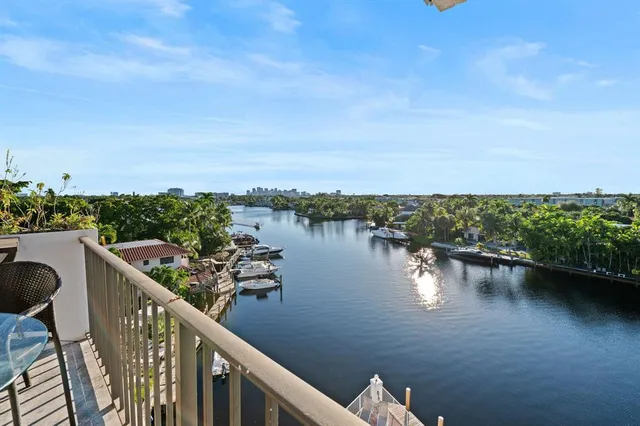 a view of a lake from a balcony