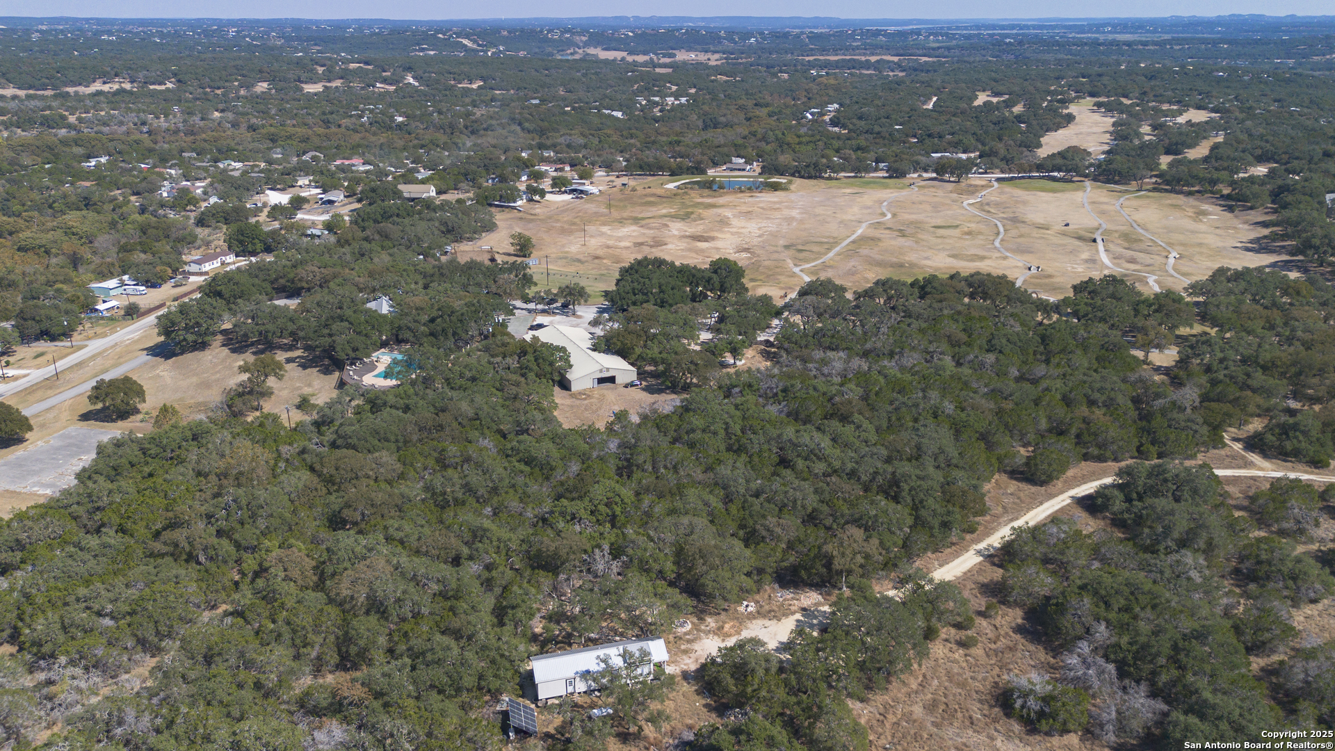 154 Fore Drive Spring Branch, TX 78070 - Photo 3 of 12 an aerial view of houses with yard