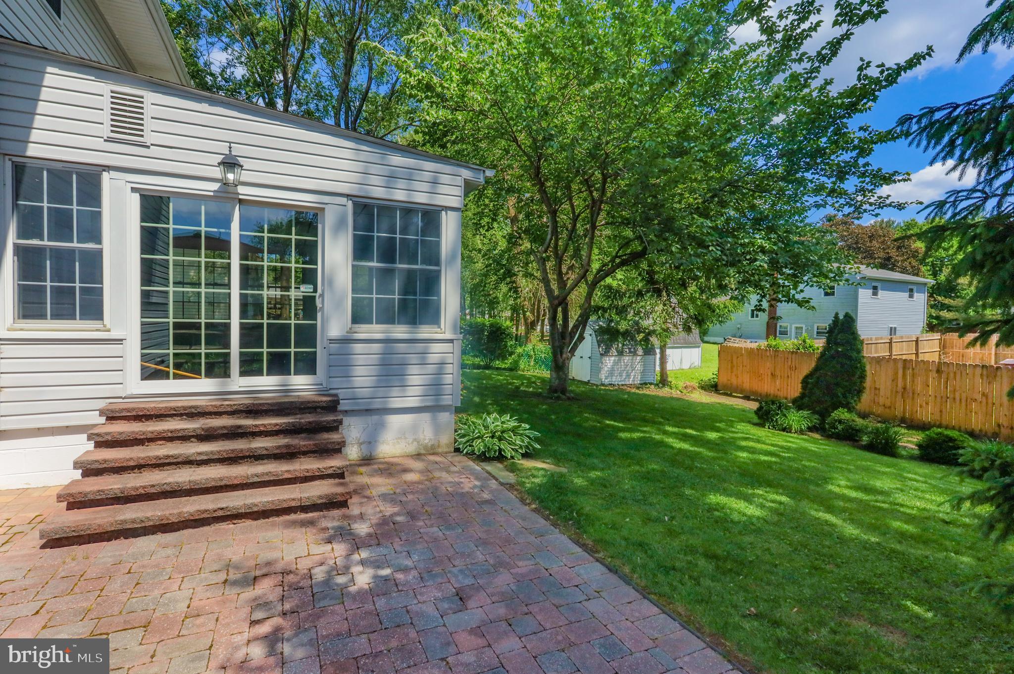 502 Garrick Road Hockessin, DE 19707 - Photo 30 of 31 Patio off 3 Season Porch