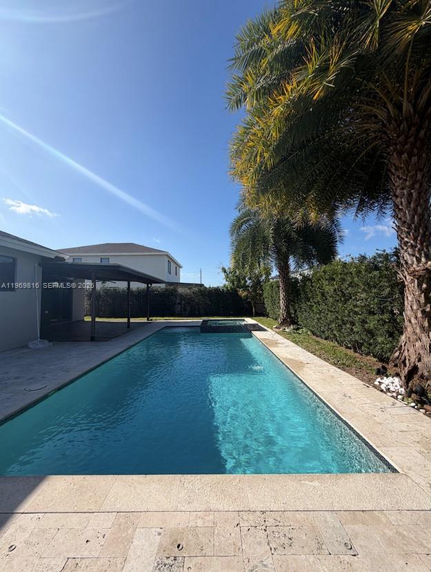 a view of a back yard of the house