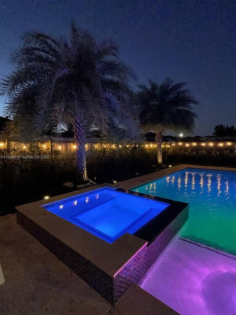 27844 Southwest 133rd Path Homestead, FL 33032 - Photo 2 of 19 a view of an outdoor space pool patio and outdoor kitchen