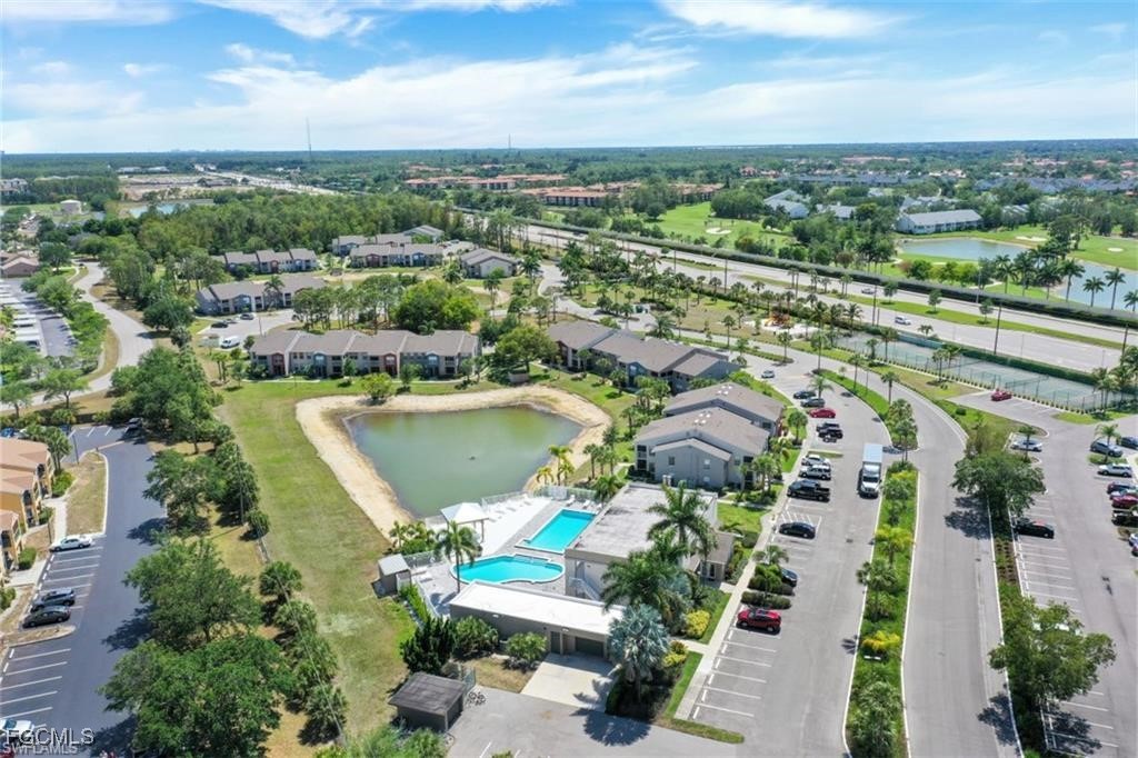 161 Santa Clara Drive, Unit 57S Naples, FL 34104 - Photo 11 of 23 an aerial view of a city with lots of residential buildings ocean and mountain view in back